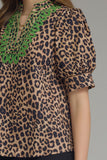 T31886 Lopsrd Print Embroidered Top